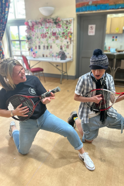 JP Andover members with tennis rackets