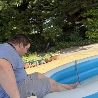 in the paddling pool feet dipped in 